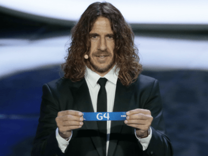 Former Spanish soccer international Carles Puyol holds a lot at the 2018 soccer World Cup