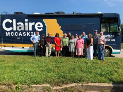 Missouri Sen. Claire McCaskill and group of people outside campaign RV.