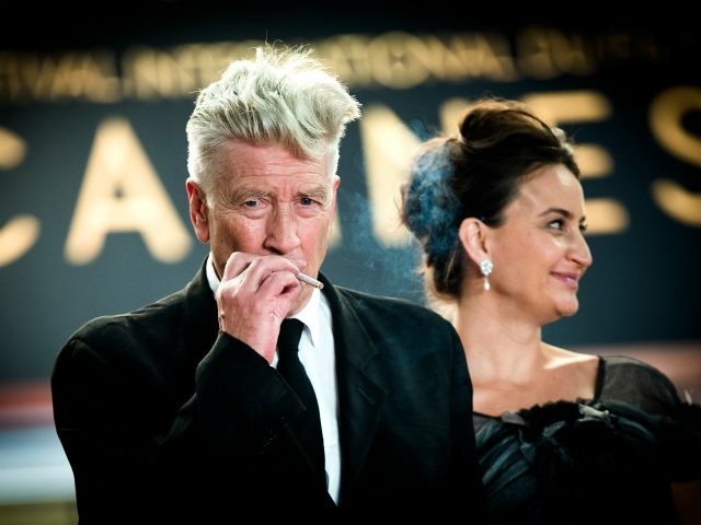 Director David Lynch smokes as he departs the 'Twin Peaks' screening during the