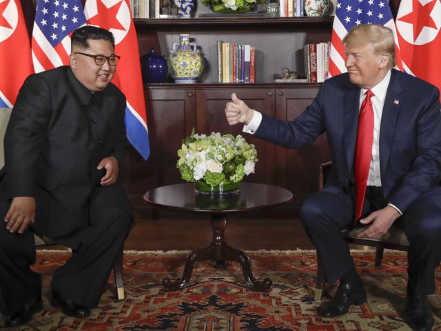Donald Trump gives Kim Jong-un thumbs up (Evan Vucci / Associated Press)