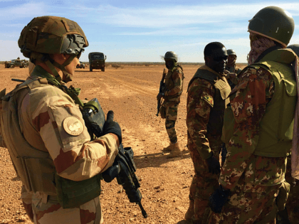 Malian soldiers taking part in the 'Hawbi' tactical coordination operation and soldiers of the France's Barkhane mission patrol on November 2, 2017 in central Mali, in the border zone with Burkina Faso and Niger as a joint anti-jihadist force linking countries in the Sahel began operations on November 1. The …