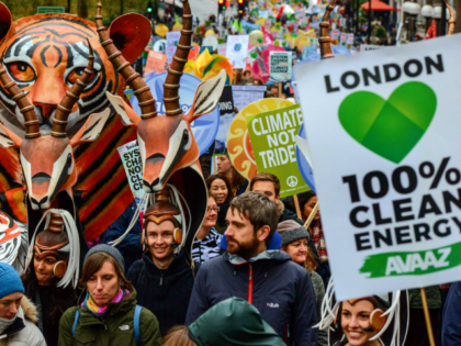 LONDON, ENGLAND - NOVEMBER 29: Protesters march down Piccadilly during the London Climate