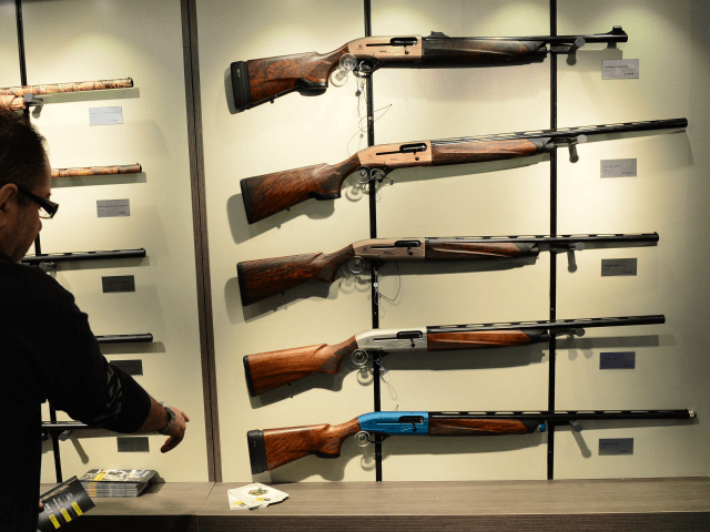 Rifles are displayed during the International Exa 20013 Arms, security and outdoor show on April 15, 2013 in Brescia. Exa is one of the most important International Sporting and Outdoor Shows in the world .AFP PHOTO / GIUSEPPE CACACE (Photo credit should read GIUSEPPE CACACE/AFP/Getty Images)