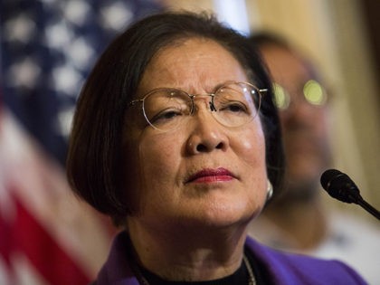 WASHINGTON, DC - DECEMBER 10: Sen. Mazie Hirono (D-HI) listens to a question during a news conference to discuss U.S. President Barack Obama's executive order on immigration, on Capitol Hill, December 10, 2014 in Washington, DC. President Obama traveled to Nashville, Tennessee on Tuesday, where he defended his actions on …