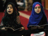 GettyImages-695613492 Iraqi girls attend a Koran reading class at the Sheikh Abdul Qadir al-jailani mosque in central Baghdad on June 13, 2016 during the Muslim holy fasting month of Ramadan. / AFP PHOTO / AHMAD AL-RUBAYE (Photo credit should read AHMAD AL-RUBAYE/AFP/Getty Images)