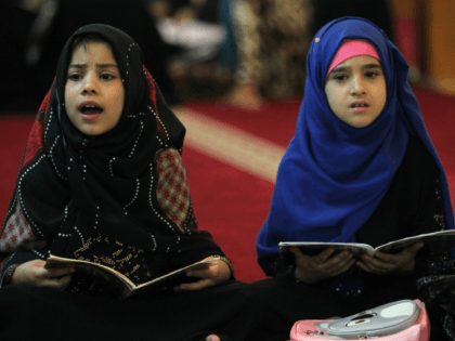 Iraqi girls attend a Koran reading class at the Sheikh Abdul Qadir al-jailani mosque in ce