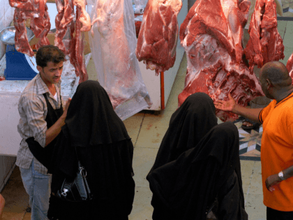 Saudi women buy halal meat