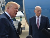 US President Donald Trump speaks to the press before making his way to board Air Force One on May 4, 2018 at Andrews Air Force Base, Maryland as he heads to Dallas, Texas to address the National Rifle Association Leadership Forum. - Shown (C) is White House Chief of Staff …