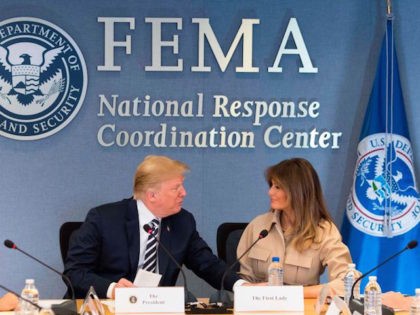 US President Donald Trump (C-L), with US Vice President Mike Pence (2nd L) and First Lady Melania Trump (C R), visits the Federal Emergency Management Agency Headquarters and attend a 2018 Hurricane Briefing in Washington, DC, on June 6, 2018. (Photo by JIM WATSON / AFP) (Photo credit should read …