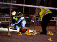 Policemen search the scene after five people were hurt in a shooting in the centre of the southern Swedish city of Malmo on June 18, 2018. - A police spokesman told AFP that the possibility of a terrorist link to the attack had been discounted. Witness were quoted as saying …