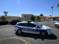 GettyImages-983499054 Police officers drive a car on June 25, 2018 in Tonnay-Charente near the house of Guy S., the alleged leader of a group linked with the ultra right 'AFO' (Action of Operational Forces) who was arrested along with 9 other people in France for allegedly planning attacks against Muslims in …