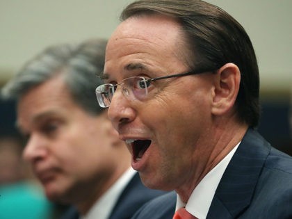 WASHINGTON, DC - JUNE 28: U.S. Deputy Attorney General Rod Rosenstein (R) and FBI Director