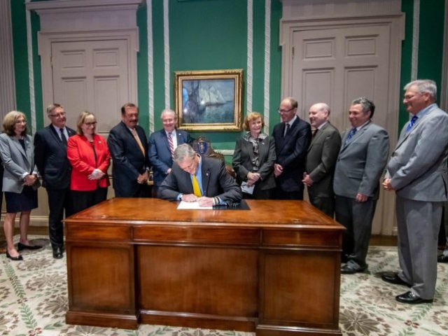 Charlie Baker, the Republican governor of Massachusetts, signed a bill Thursday that will