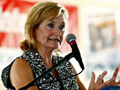 In this July 27, 2017, file photo Mississippi Commissioner of Agriculture and Commerce Cindy Hyde-Smith speaks at the Neshoba County Fair in Philadelphia, Miss. The state's governor will appoint Hyde-Smith as Mississippi's first female member of Congress to fill the Senate vacancy that will soon be created when Sen. Thad …