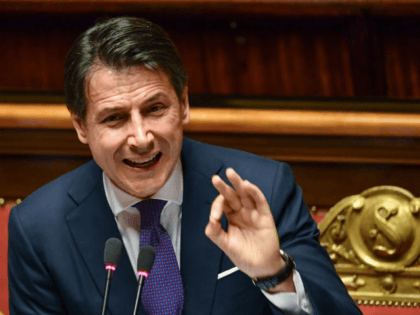 Italys Prime Minister Giuseppe Conte gestures as he speaks during a confidence debate at the Senate in Rome on June 5, 2018.