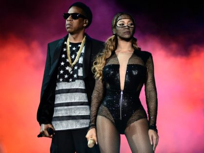 IMAGE DISTRIBUTED FOR PARKWOOD ENTERTAINMENT - Beyonce and JAY Z perform during the Beyonce and Jay Z - On the Run tour at AT&T Park on Tuesday, Aug. 5, 2014, in San Francisco. (Photo by Mason Poole/Invision for Parkwood Entertainment/AP Images)