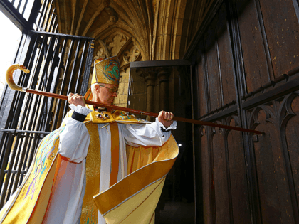 CANTERBURY, ENGLAND - MARCH 21: The Most Reverend Justin Welby, strikes three times on the West Door of Canterbury Cathedral with his pastoral staff prior to his enthronement service to become Archbishop of Canterbury at Canterbury Cathedral on March 21, 2013 in Canterbury, England. The newly appointed Archbishop of Canterbury …