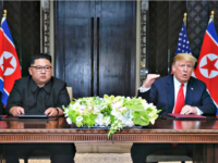 Kim Jong-un, Trump Kevin LimThe Strait TimesHandoutGetty Kim Jong-un, Trump
