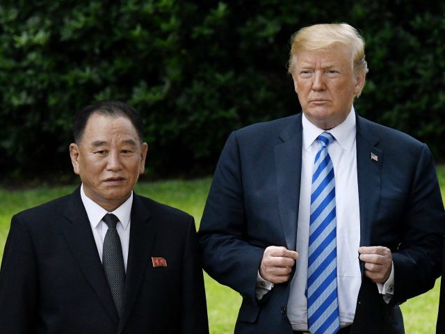 US President Donald Trump stands with Kim Yong Chol, former North Korean military intelligence chief and one of leader Kim Jong Un's closest aides, on the South Lawn of the White House on June 1, 2018 in Washington, DC. Both Trump and Kim Yong Chol are trying to salvage a …