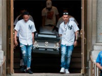 The body of Lesandro Guzman-Feliz is taken from the Our Lady of Mount Carmel church after funeral services on June 27, 2018 in New York. - Lesandro Guzman-Feliz, 15, was stabbed to death outside a Bronx bodega in an apparent case of mistaken identity. (Photo by Don EMMERT / AFP) …