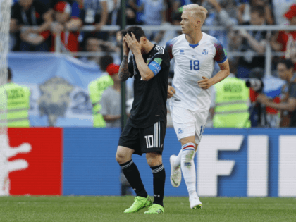 Argentina's Lionel Messi, left, reacts after missing to score during the group D match between Argentina and Iceland at the 2018 soccer World Cup in the Spartak Stadium in Moscow, Russia, Saturday, June 16, 2018. (AP Photo/Victor Caivano)