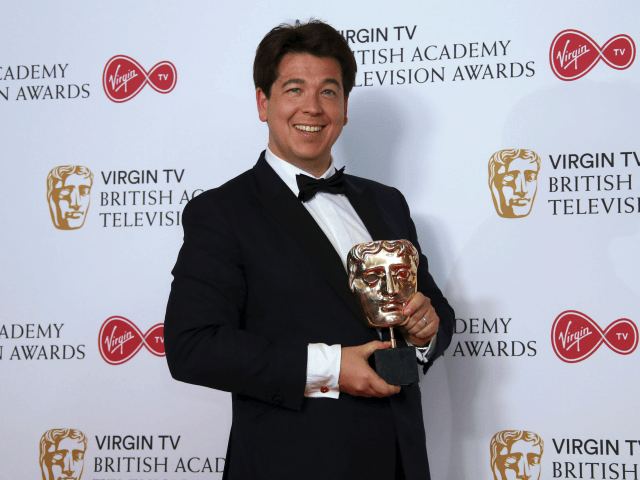 Comedian Michael McIntyre poses with his Bafta for Best Entertainment Performance at the B