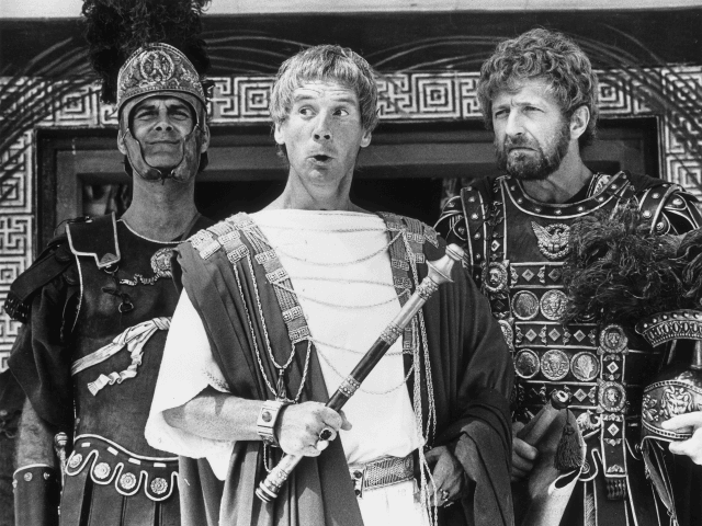 1979: Members of the British comedy team, Monty Python, during the filming of their controversial film 'The Life of Brian', (from left) John Cleese as a centurion, Michael Palin as Pontius Pilate and Graham Chapman as Biggus Dickus. (Photo by Evening Standard/Getty Images)