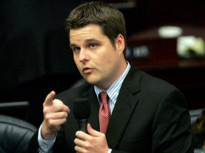 Rep. Matt Gaetz, R-Fort Walton Beach, answers questions about the medical marijuana bill during session on Thursday, May 1, 2014, in Tallahassee, Fla. A strain of low-THC marijuana would be legal in Florida for medical use under a bill passed by the House. (AP Photo/Steve Cannon)