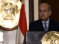 Egypt Prime Minister Sherif Ismail and his French counterpart Manuel Valls (unseen) take part in a joint press conference at the Office of the Prime Minister on October 10, 2015 in the Egyptian capital Cairo. Valls arrived in Egypt to start a three-country Arab tour aimed at boosting economic ties …