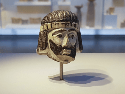 This Monday, June 4, 2018 photo shows a detailed figurine of a king's head on display at the Israel Museum, dating to biblical times, and found last year near Israel's northern border with Lebanon, in Jerusalem. A palm-sized enigmatic sculpture of a king's head dating back nearly 3,000 years has …