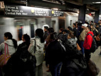 crowded-d-train-platform-nyc-subway-getty ROCKAWAY, NY - NOVEMBER 4: Commuters wait for the D train November 4, 2012 in New York City. A week after Superstorm Sandy hit the city, most of the subway lines are running, with some lines still suspended and others running on a limited basis. (Photo by Allison Joyce/Getty Images)