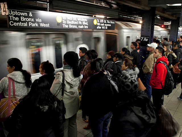 ROCKAWAY, NY - NOVEMBER 4: Commuters wait for the D train November 4, 2012 in New York Cit