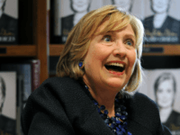 Hillary Rodham Clinton signs copies of her book Hard Choices at Books and Books on October 2, 2014 in Coral Gables, Florida.(Photo by Jeff Daly/Invision/AP)