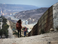 immigrant-mother-child-border-getty Mario Tama/Getty Images