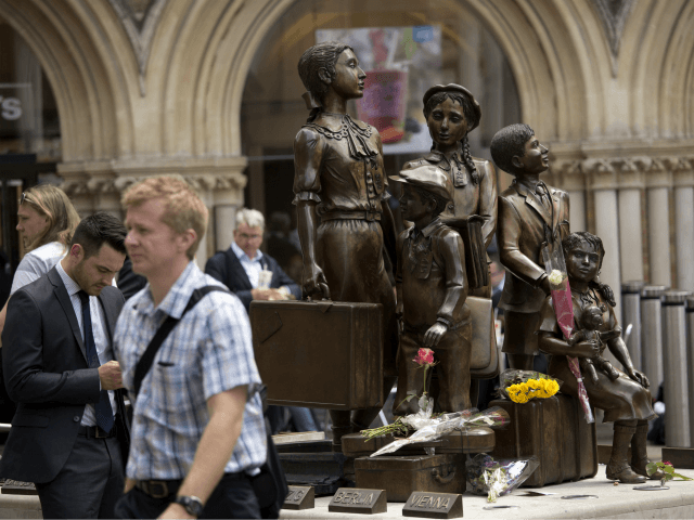Flowers lie in memory of Britain's Sir Nicholas Winton on German-born Jewish sculptor Fran