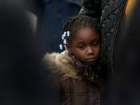 little-girl-sad-black-youth-killed-armed-with-hairbrush-getty A girl stands with her mother near the spot where a youth was shot and killed by a policeman November 13, 2007 in Brooklyn, New York. After receiving a 911 call from the youth?s mother, New York City police shot and killed an 18-year-old youth who was armed with a …