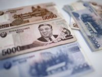 Kim Il Sung is seen on the 5,000 bill of the North Korean won, Monday, Feb. 6, 2017. While foreign brand-name goods are often paid for in the U.S. dollars, Euros or Chinese yuan, and priced accordingly at the official exchange rate, most people buy their daily necessities in North …