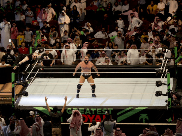 World Wrestling star Rusev is greeted by fans during his match of the "Greatest Royal Rumb