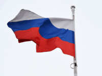 russian flag A Russian flag flies in front of a ruby star atop one of the Kremlin's towers in downtown Moscow on March 13, 2018. Russia will hold presidential elections on March 18, 2018. / AFP PHOTO / Kirill KUDRYAVTSEV (Photo credit should read KIRILL KUDRYAVTSEV/AFP/Getty Images)
