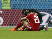 sardar Iran's Sardar Azmoun is consoled at the end of the group B match between Iran and Spain at the 2018 soccer World Cup in the Kazan Arena in Kazan, Russia, Wednesday, June 20, 2018. Spain won 1-0. (AP Photo/Frank Augstein)