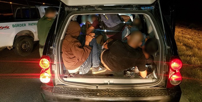 Laredo Sector Border Patrol agents find ten illegal immigrants and three U.S. citizen human smugglers packed into an SUV. (Photo: U.S. Border Patrol/Laredo Sector)