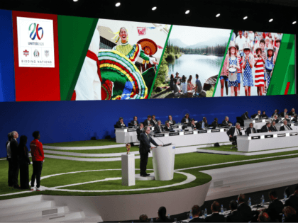 Decio de Maria, President of the Football Association of Mexico, presents a joint United bid by Canada, Mexico and the United States to host the 2026 World Cup at the FIFA congress in Moscow, Russia, Wednesday, June 13, 2018. (AP Photo/Pavel Golovkin)