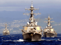 USS Hopper China says the USS Hopper, center in this 2009 file photo, was involved in a close encounter near a Chinese island in the South China Sea this week. File photo by Michael A. Lantron/U.S. Navy/UPI