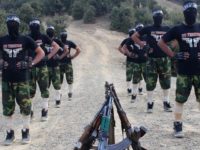 taliban uniforms Pakistani Taliban (TTP) out training in some new, not so cool, outfit. Not really sure what the 'no tension' is about.