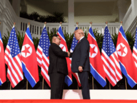 trump north korea North Korea's leader Kim Jong Un (L) shakes hands with US President Donald Trump (R) at the start of their historic US-North Korea summit, at the Capella Hotel on Sentosa island in Singapore on June 12, 2018. - Donald Trump and Kim Jong Un have become on June 12 the …
