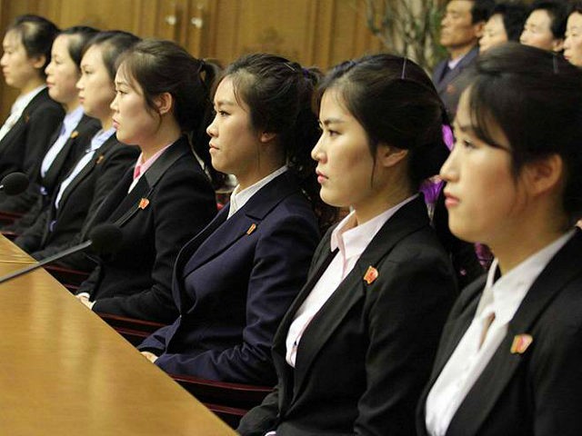 Colleagues of 12 North Korean waitresses are presented to the media in Pyongyang, North Ko