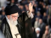 A handout picture from the office of Iran's Supreme Leader Ayatollah Ali Khamenei shows him greeting the crowd during a ceremony on June 4, 2018 A handout picture from the office of Iran's Supreme Leader Ayatollah Ali Khamenei shows him greeting the crowd during a ceremony on June 4, 2018