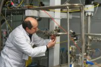 An International Atomic Energy Agency (IAEA) inspector in January 2014 disconnects cascades for 20 percent uranium production at the nuclear power plant of Natanz, some 300 kilometres south of Tehran Iran steps up pressure on uranium enrichment after US pullout