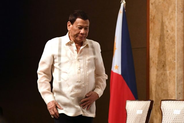 Philippines' Duterte defends kiss: 'We enjoyed it'