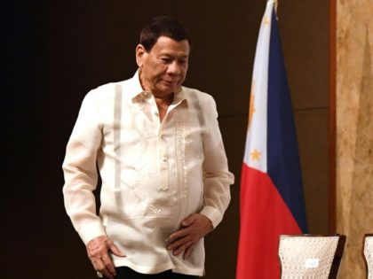 Philippines' Duterte defends kiss: 'We enjoyed it'